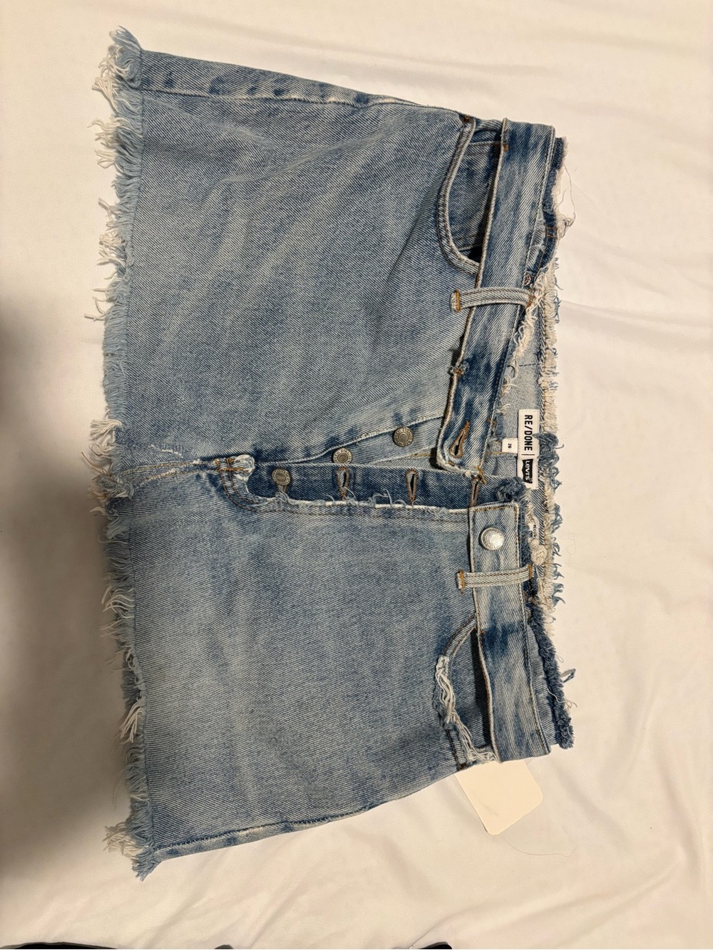 Levi's Light Blue Frayed Hem Denim Shorts